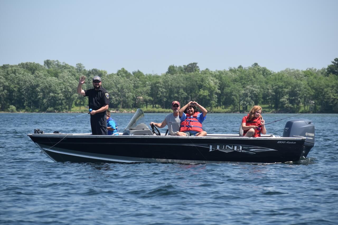 KOJB Radio Members Fishing in Boat